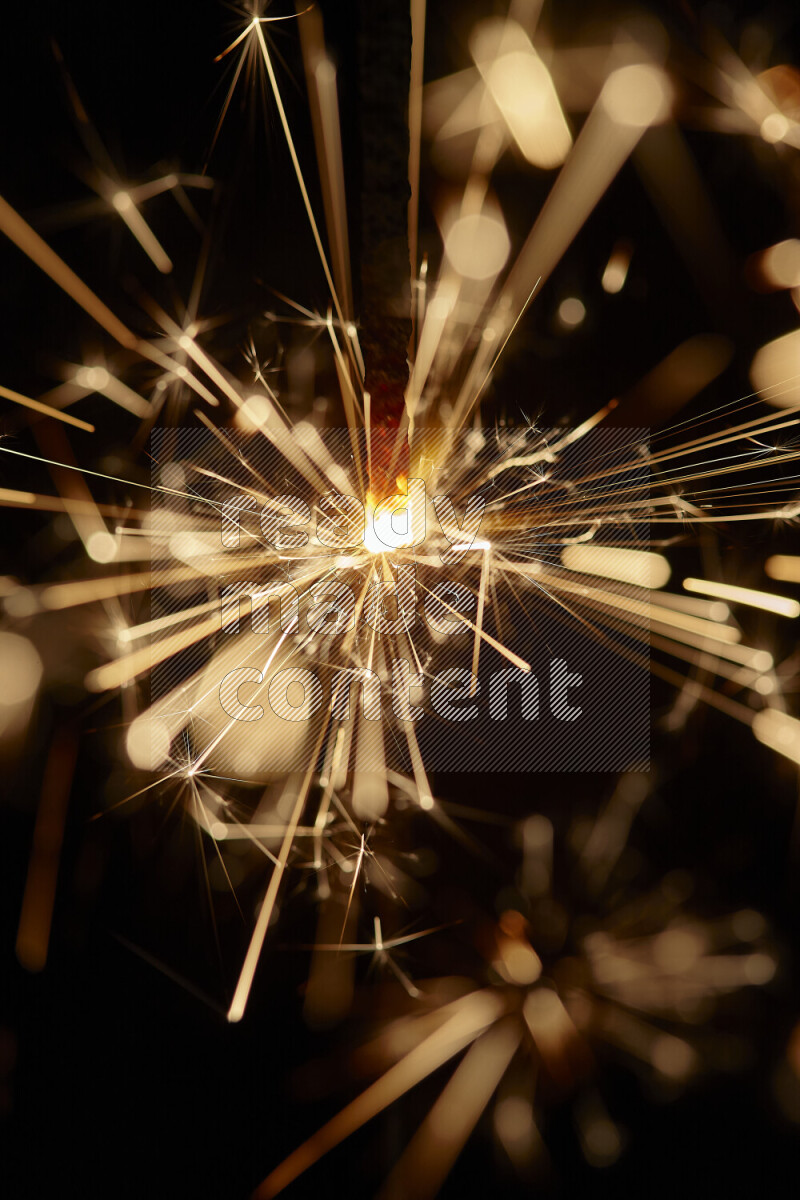 A close-up image of sparkler candle isolated on black background