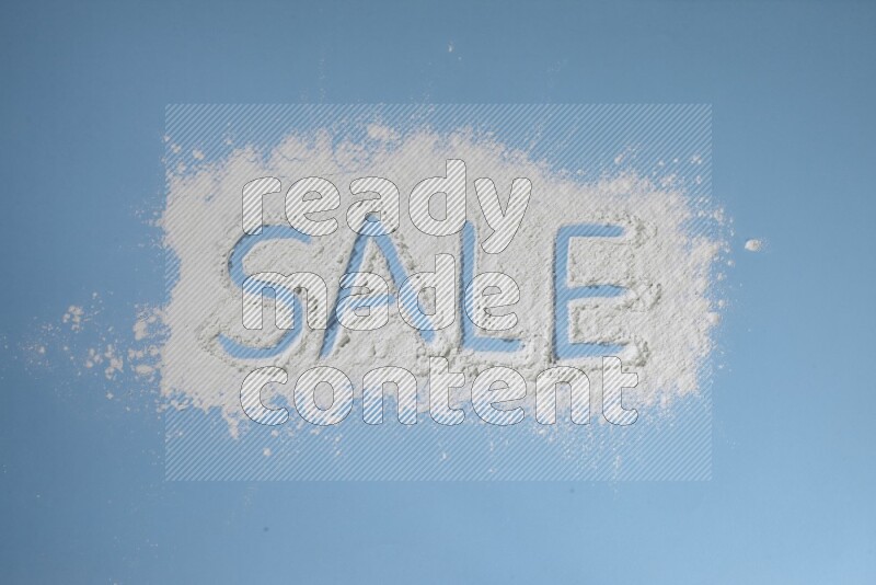 A word written with powder on blue background
