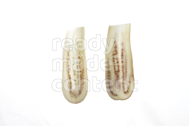 Eggplant slices on illuminated white background