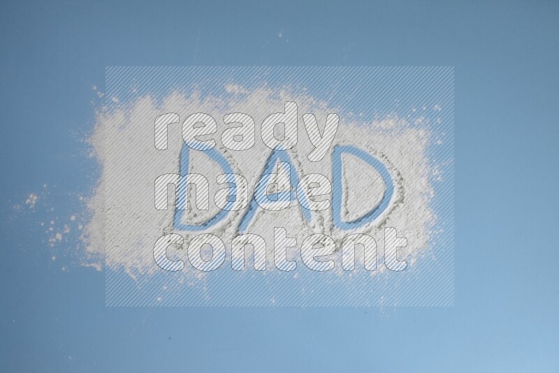 A word written with powder on blue background
