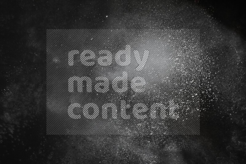 White powder explosion on black background