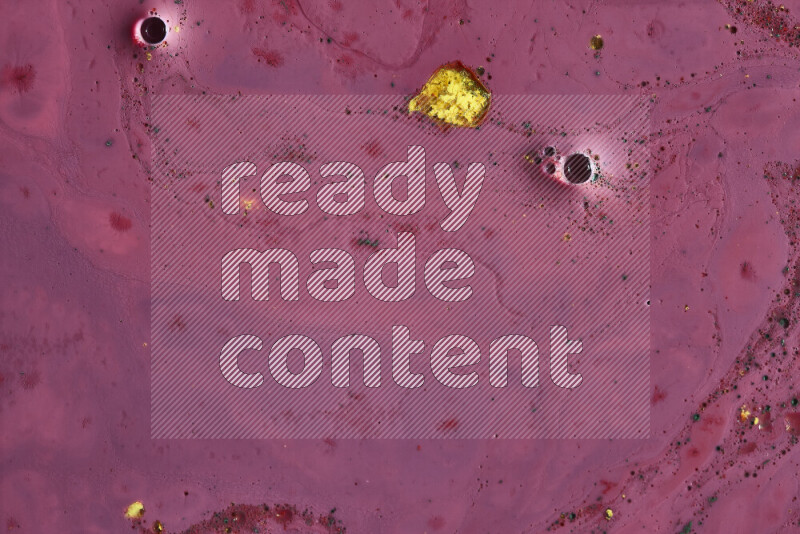 A close-up of abstract swirling patterns in red with colored particles