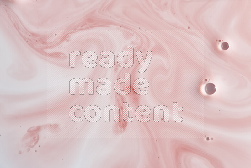 A close-up of abstract swirling patterns in red and white