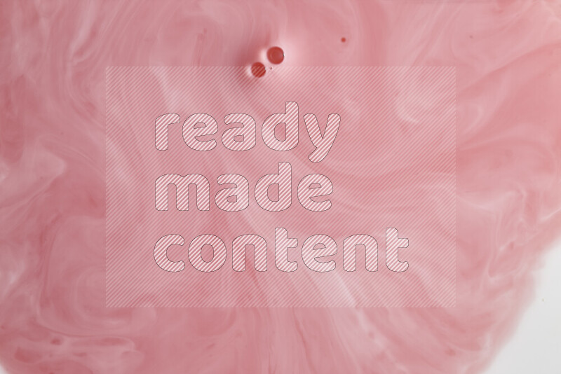 A close-up of abstract swirling patterns in red and white