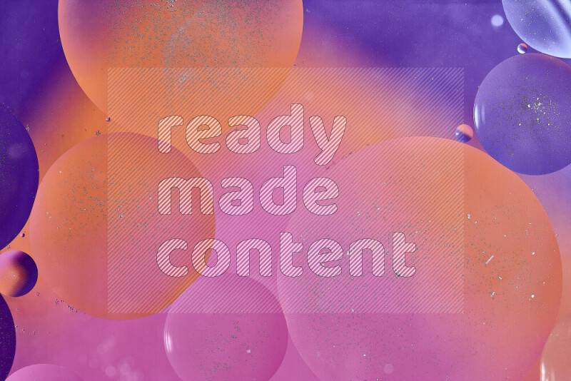 Close-ups of abstract oil bubbles on water surface in shades of purple, orange and pink