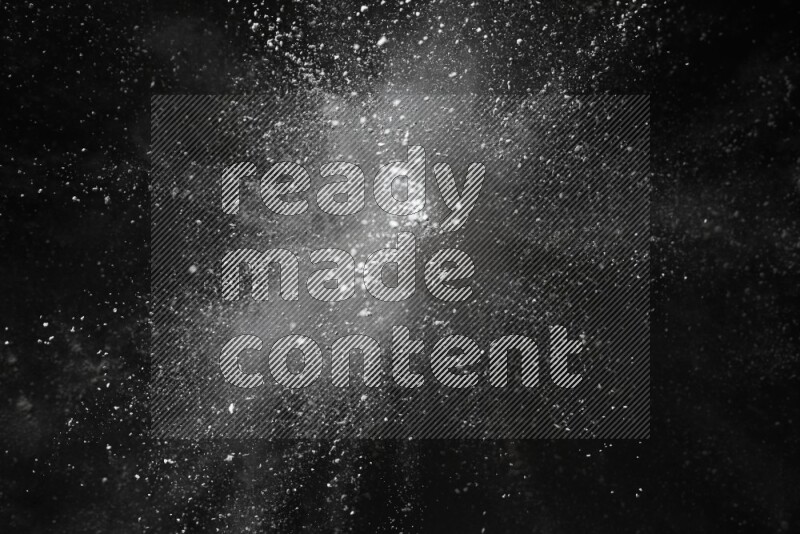 White powder explosion on black background