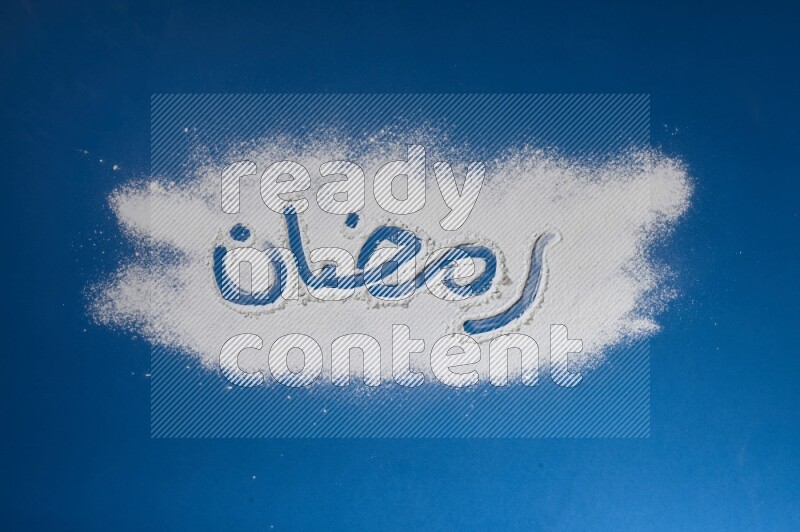 A word written with powder on blue background