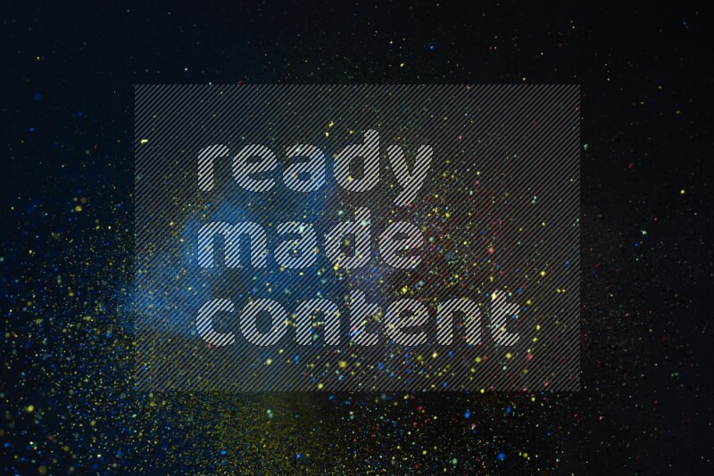 Colorful powder explosion on black background
