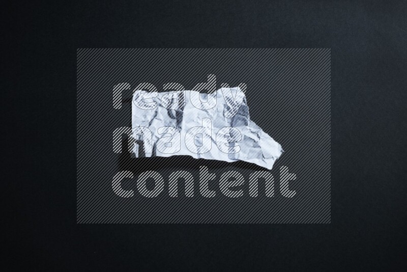 White paper sheet on black background