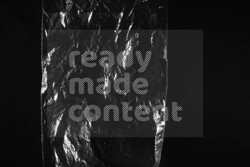 Transparent plastic textures on black background