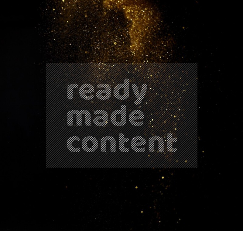 Gold glitter powder isolated on black background