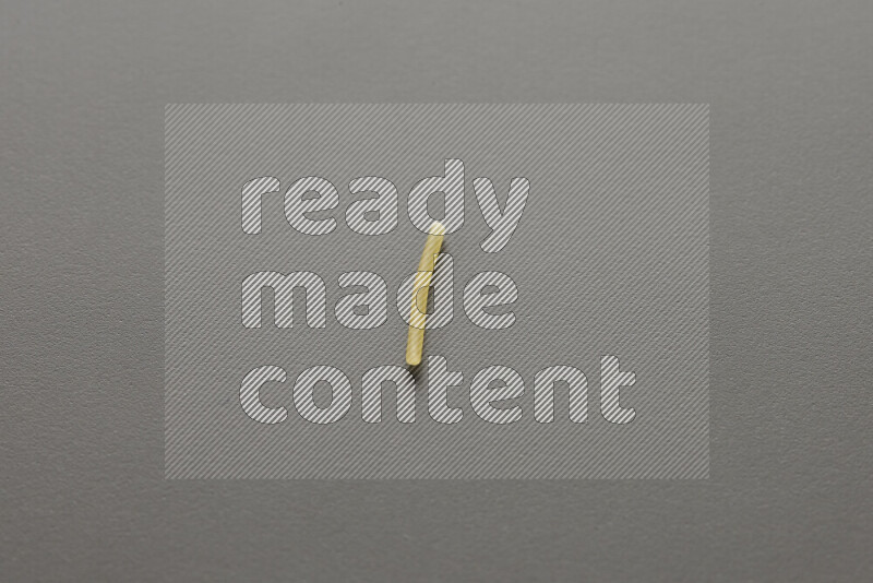 Vermicelli pasta on grey background