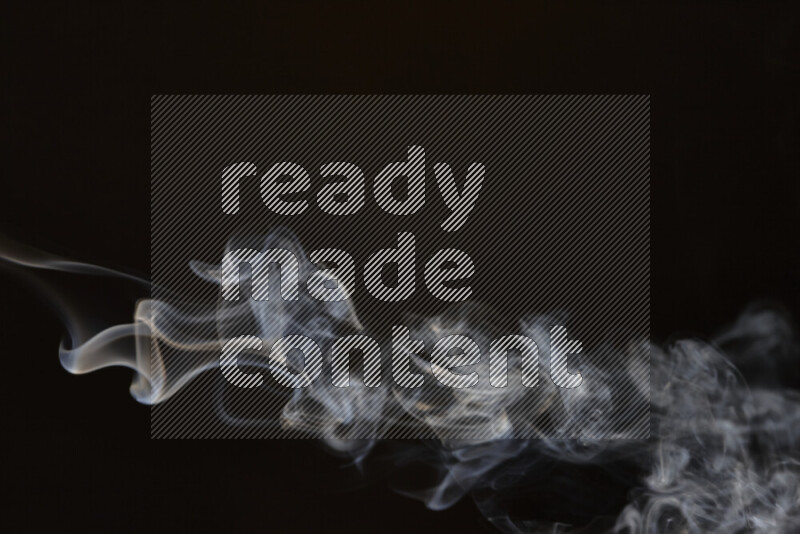 Motion of wavy smoke isolated on dark background