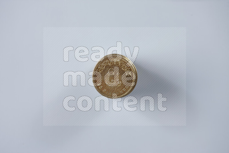 Stack Egyptian 50 piasters coins on grey background