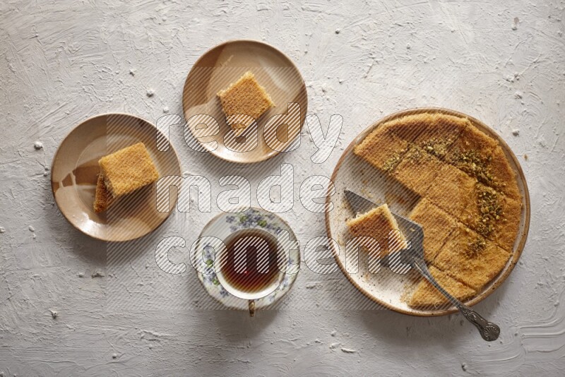 Konafa with tea in a light setup