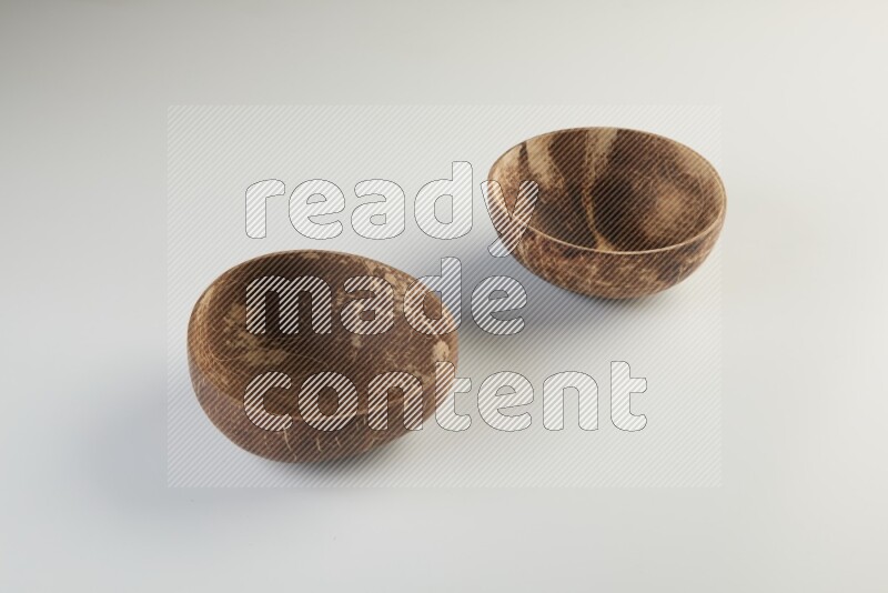 Wooden bowl and plate on white background