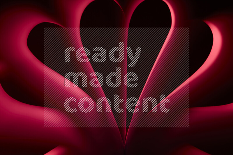 فن تجريدي يعرض منحنيات وتدرجات اللون الأحمر مكونه بضوء ملون