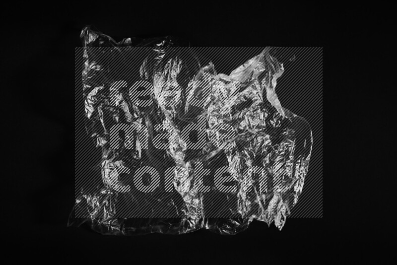 Transparent plastic textures on black background