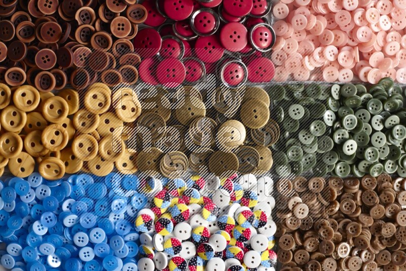 Multicolored buttons placed on grey background