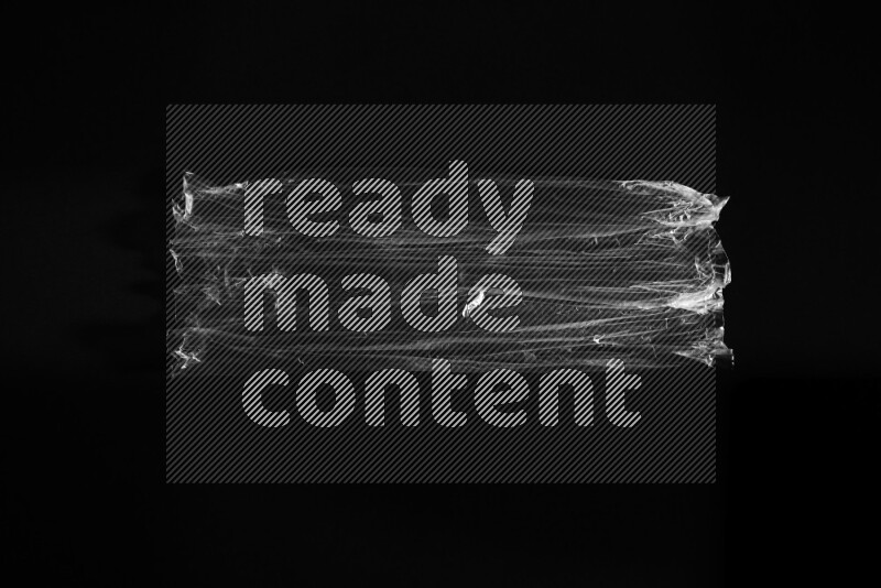 Transparent plastic textures on black background