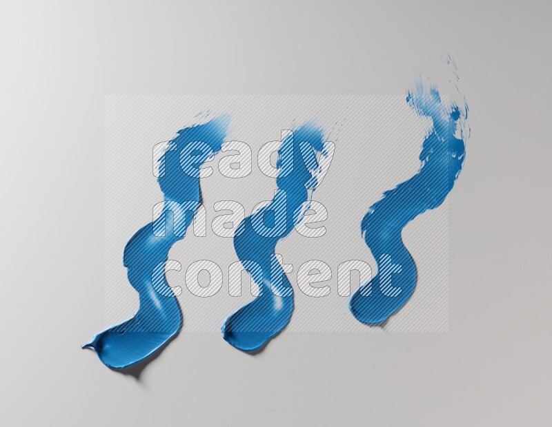 Blue zigzag painting knife strokes on white background