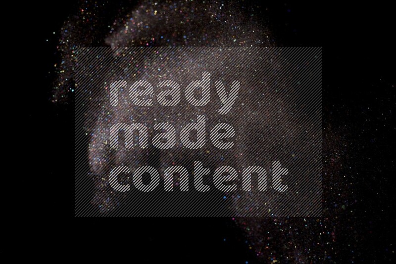 Multicolored glitter powder isolated on black background