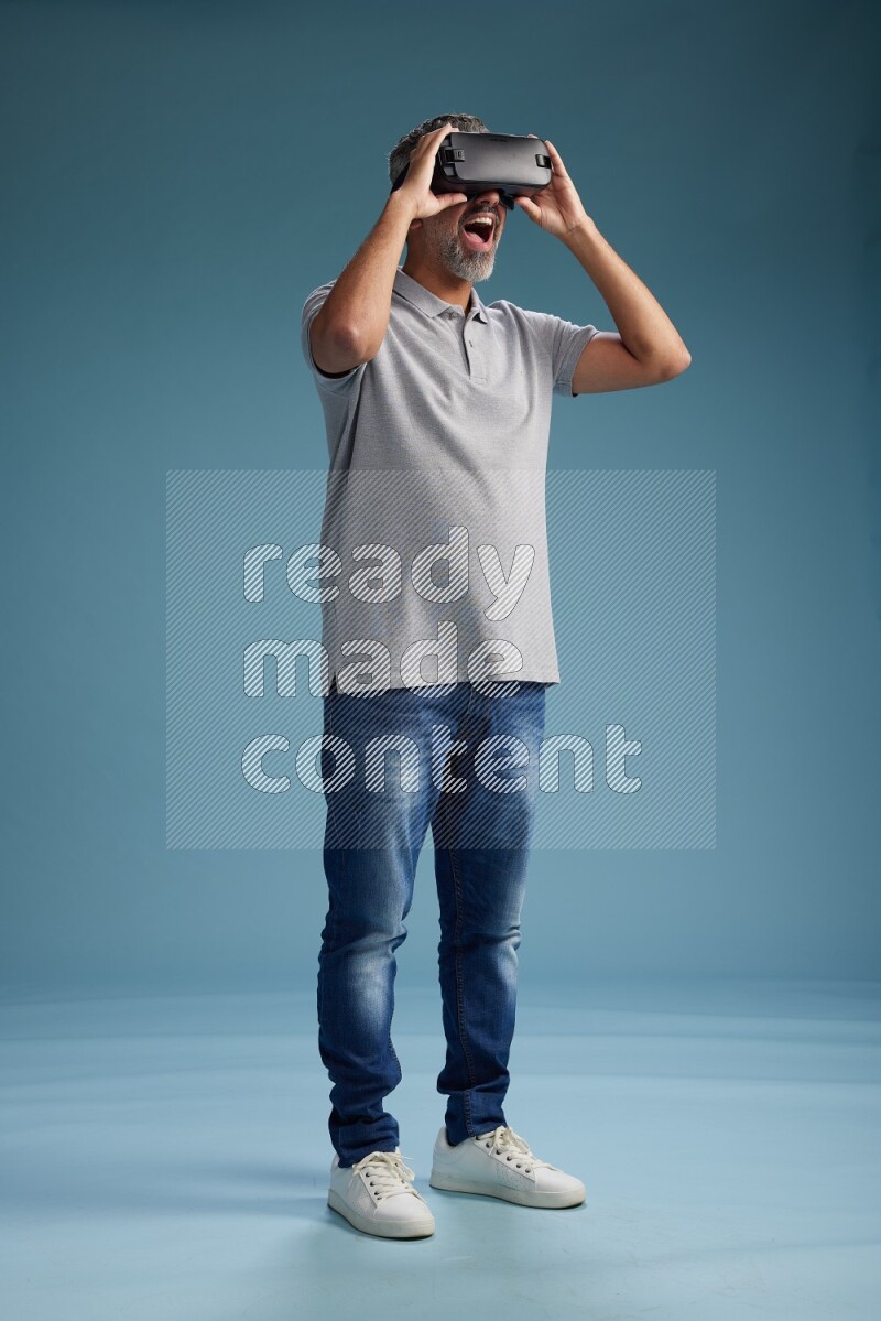 Man Standing Gaming with VR