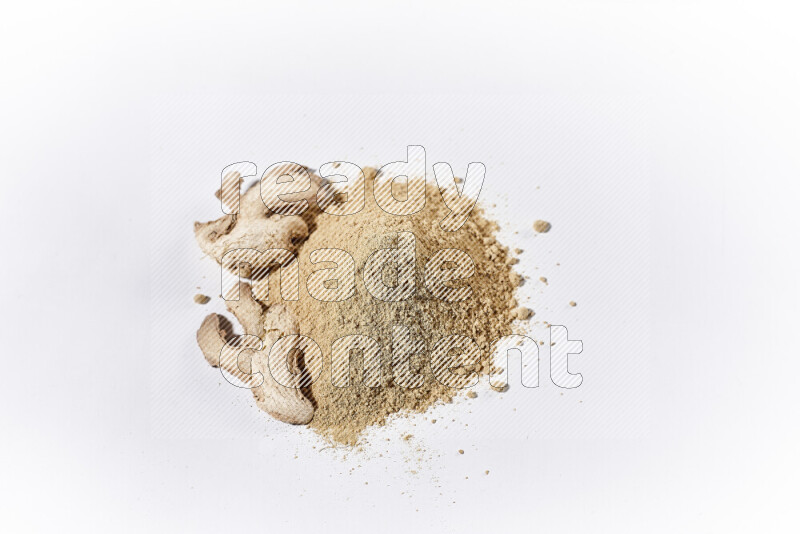 A bunch of ground ginger powder on white background