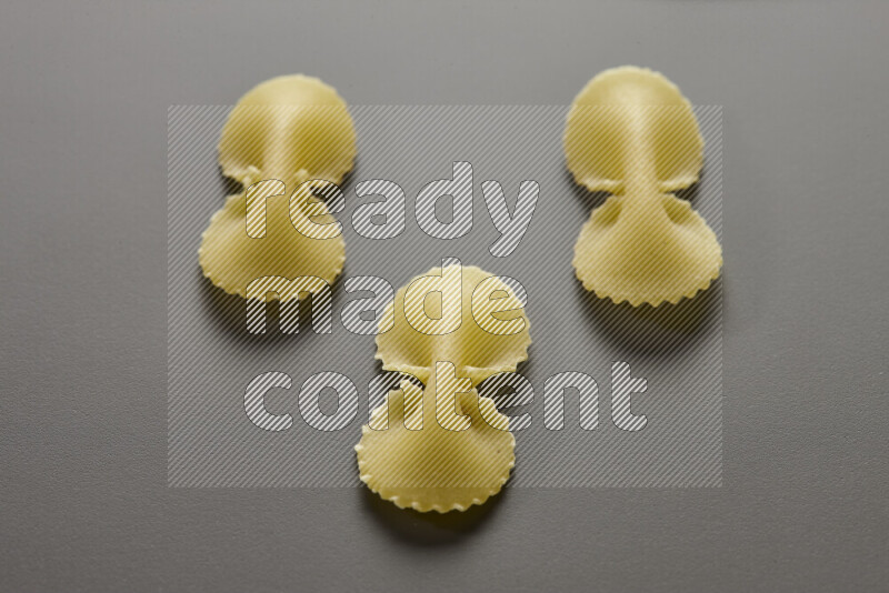 Fiocchi pasta on grey background