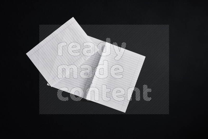 Notebook sheet on black background