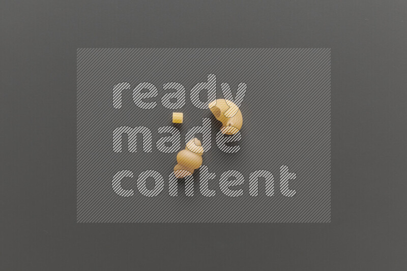 Different pasta types on grey background