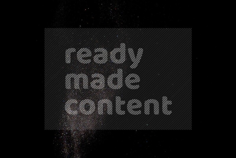 Multicolored glitter powder isolated on black background