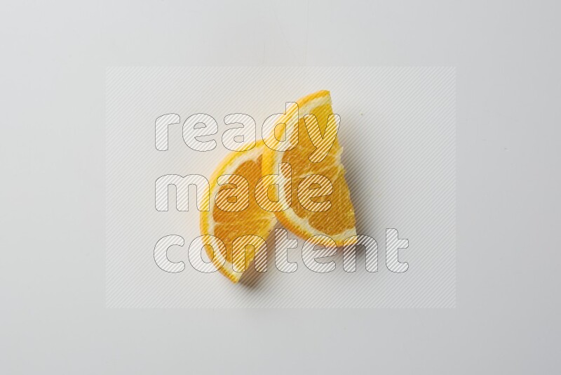 Two halves of an orange slices on white background