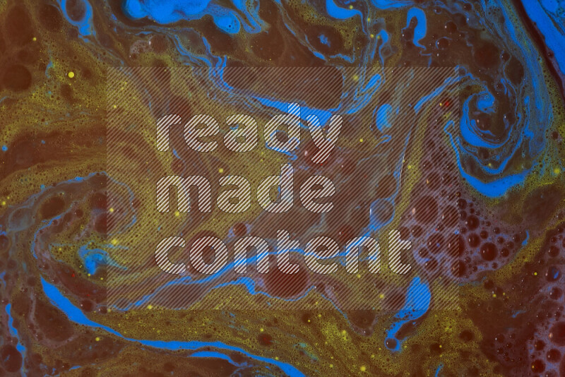 The image depicts a marbling effect with swirling patterns of red, blue and yellow