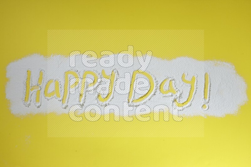 A sentence written with powder on yellow background