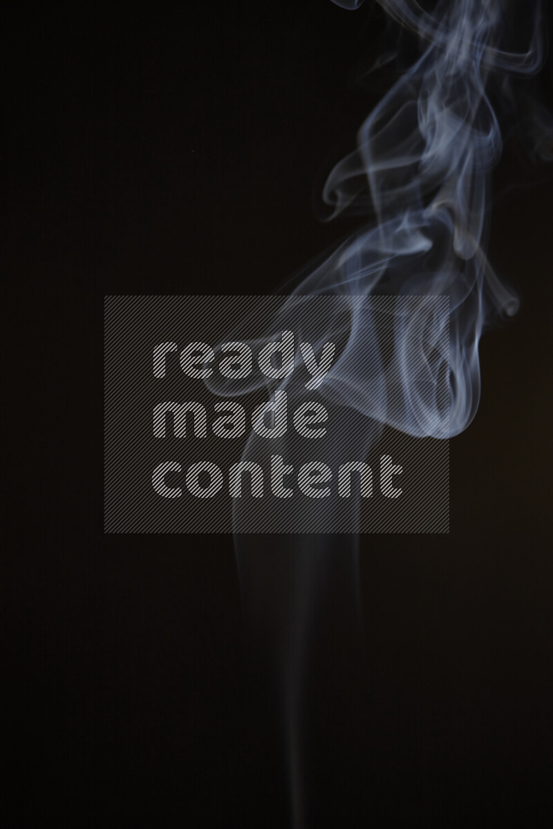 Motion of wavy smoke isolated on dark background