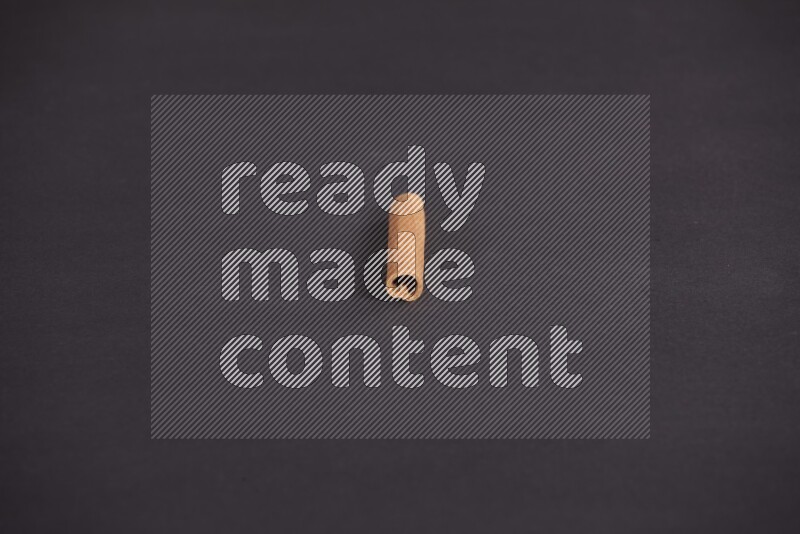 Cinnamon stick on black background