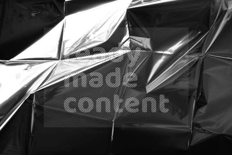 Plastic wrap texture on black background