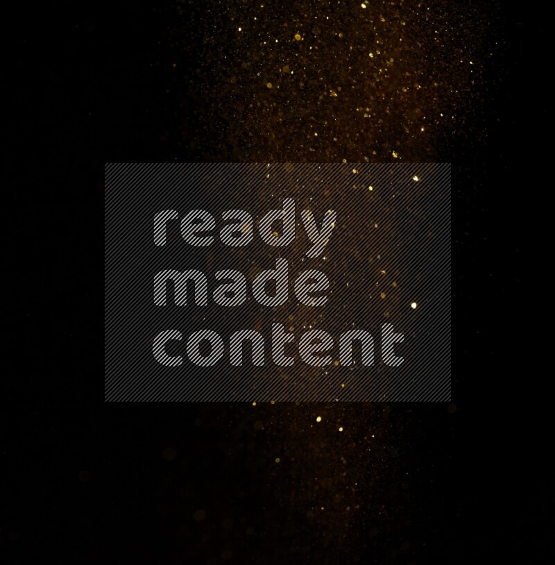 Gold glitter powder isolated on black background
