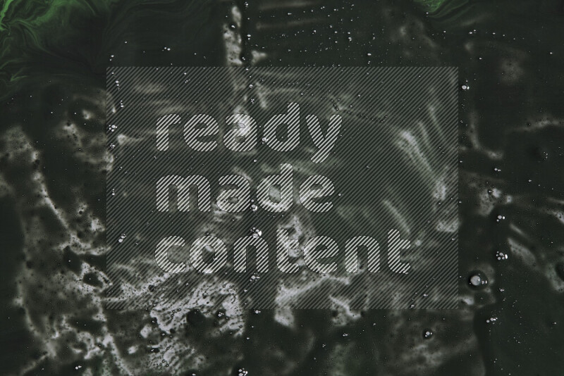 Abstract colorful background with mixed of green and black paint colors