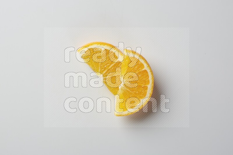 Two halves of an orange slices on white background