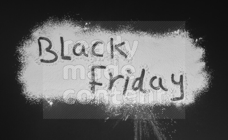 A sentence written with powder on black background