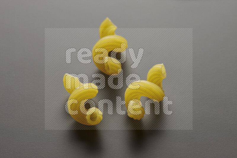 Twist pasta on grey background