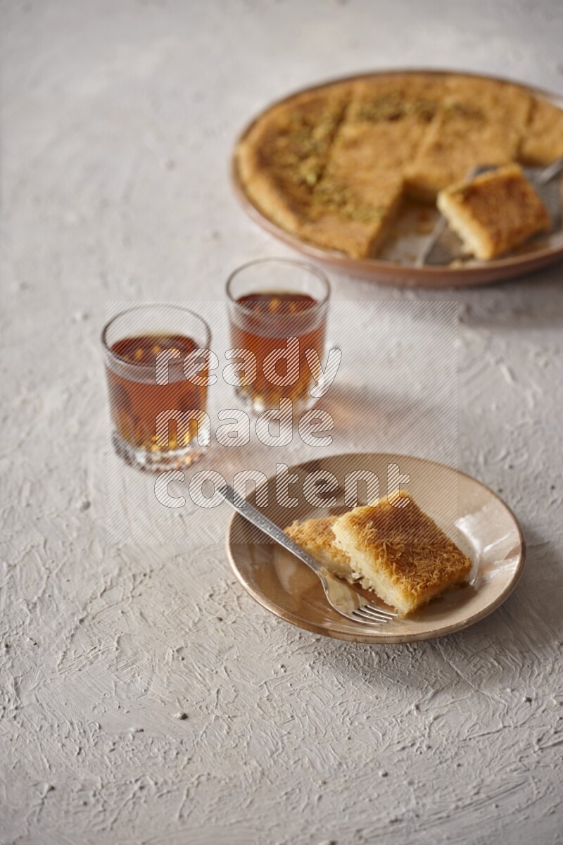Konafa with tea in a light setup