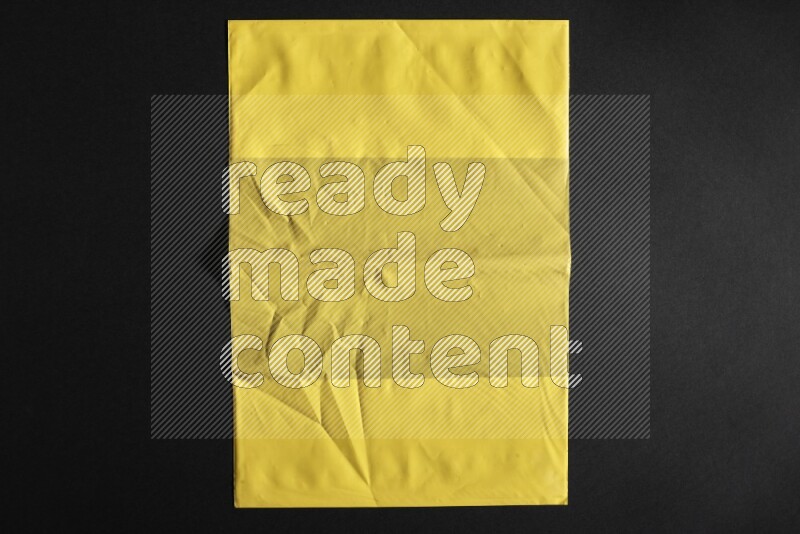 Colored plastic textures on black background