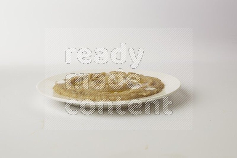 fava bean in a white plate direct on a white background