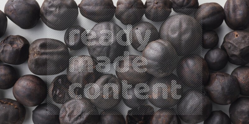 Top-view shot of dried lime (loomi) on white background