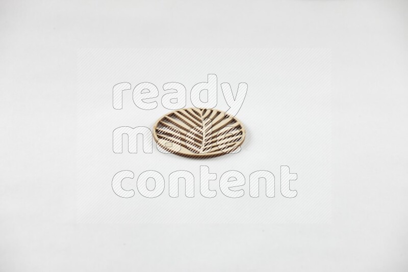 Crafted wooden coasters on white background
