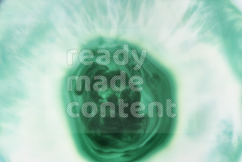 لقطة مقربة لأنماط دوامية بتدرجات اللون الأخضر