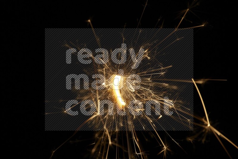 Sparkler candle isolated on black background